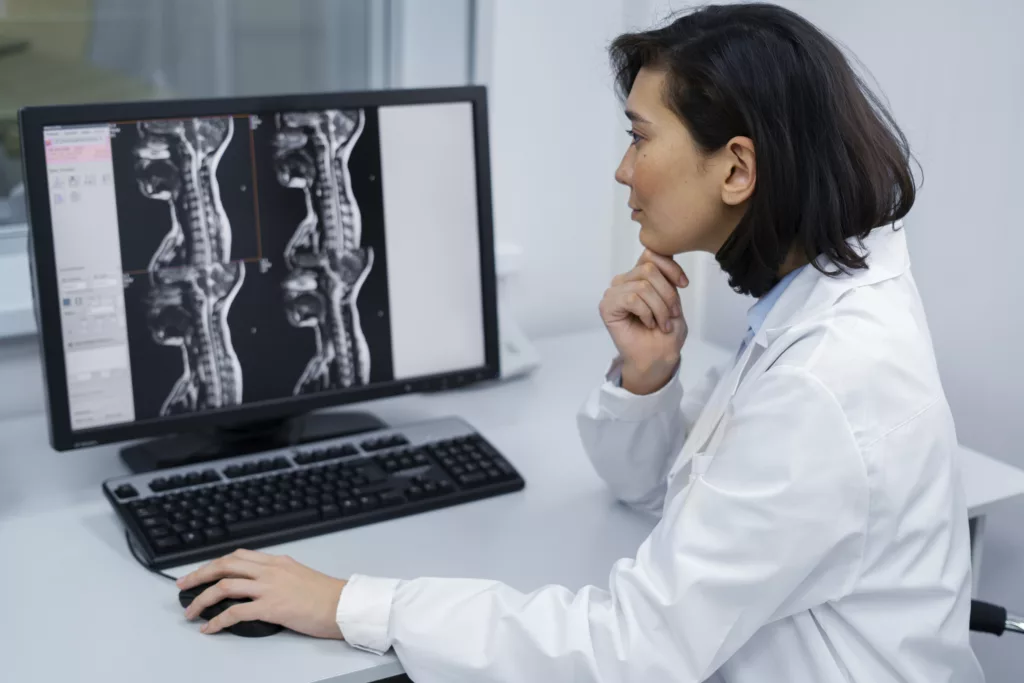 Doctor examining MRI of Cervical Spondylosis 