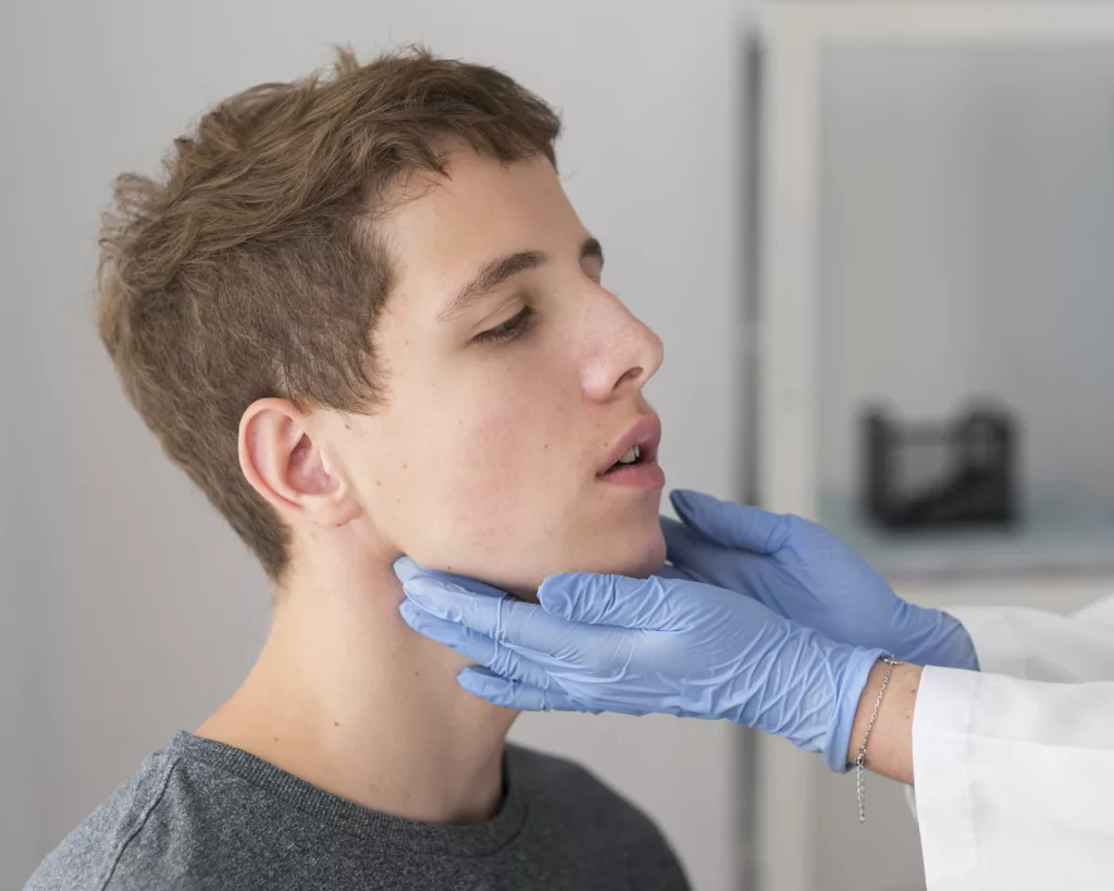 Medic examining the patient for Malocclusion of teeth