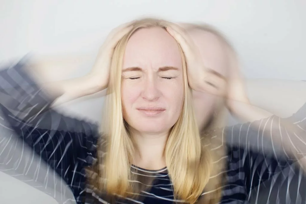 Image of a woman having dizziness due to Labyrinthitis