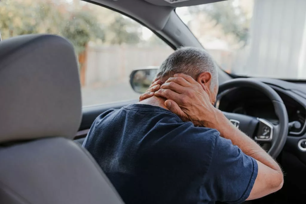 Image of an old man with whiplash injury