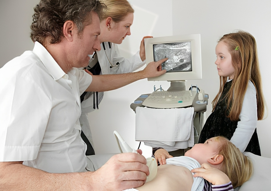 a doctor doing echocardiography of child with Hypoplastic Left Heart Syndrome