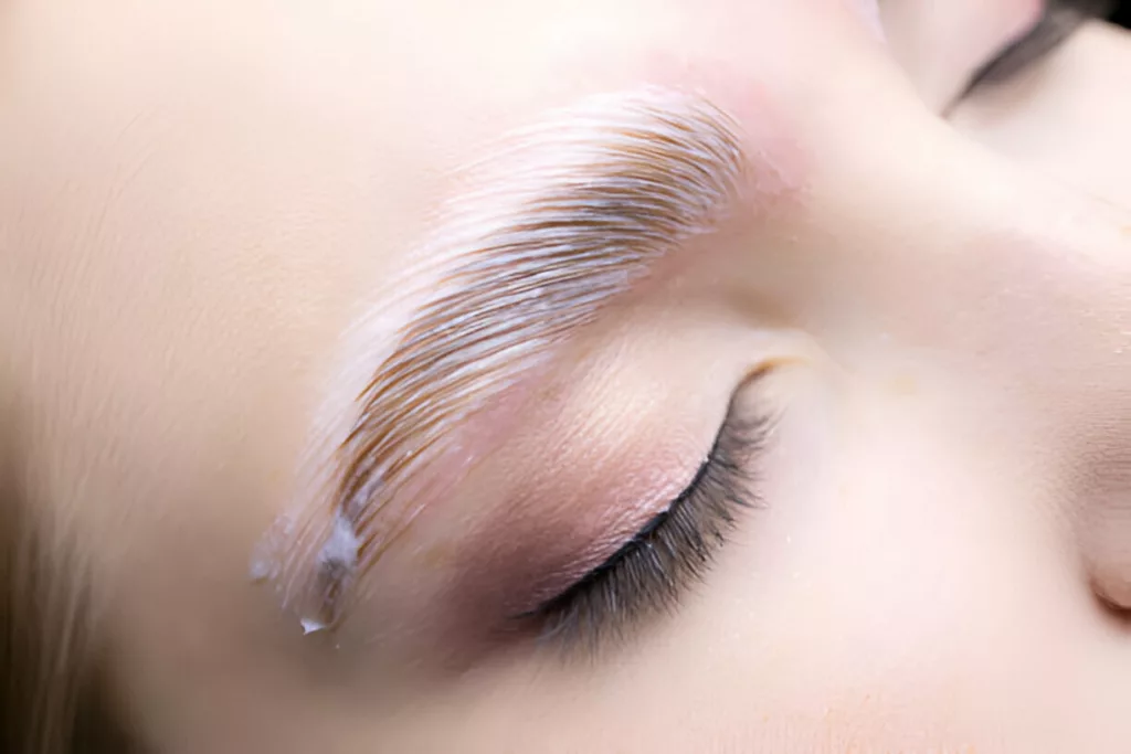 Eyebrow lamination under process to make eyebrow look fuller 