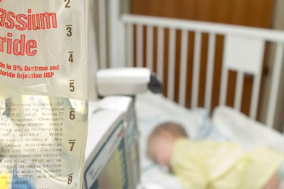 Baby in the hospital on intravenous fluids for dehydration